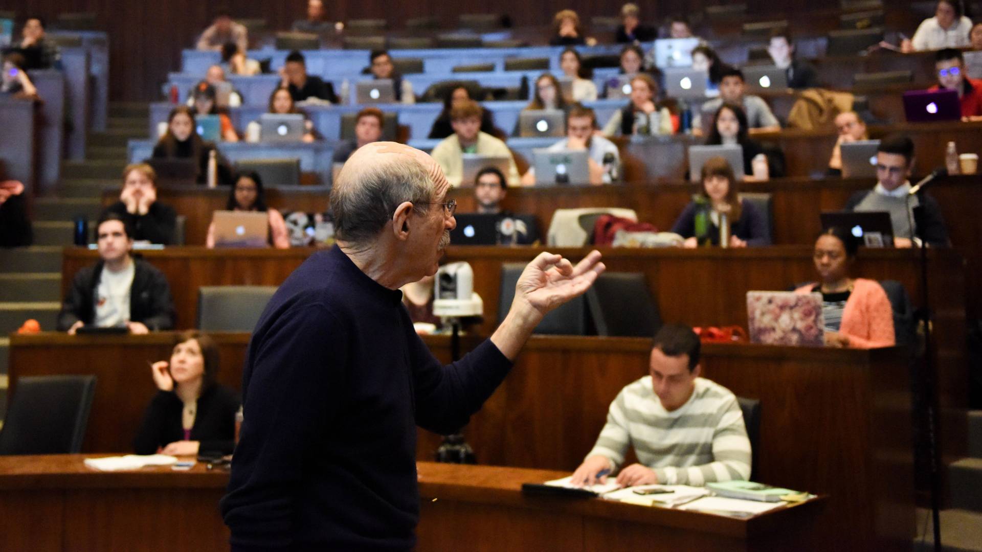 Professor talking to students in a lecture